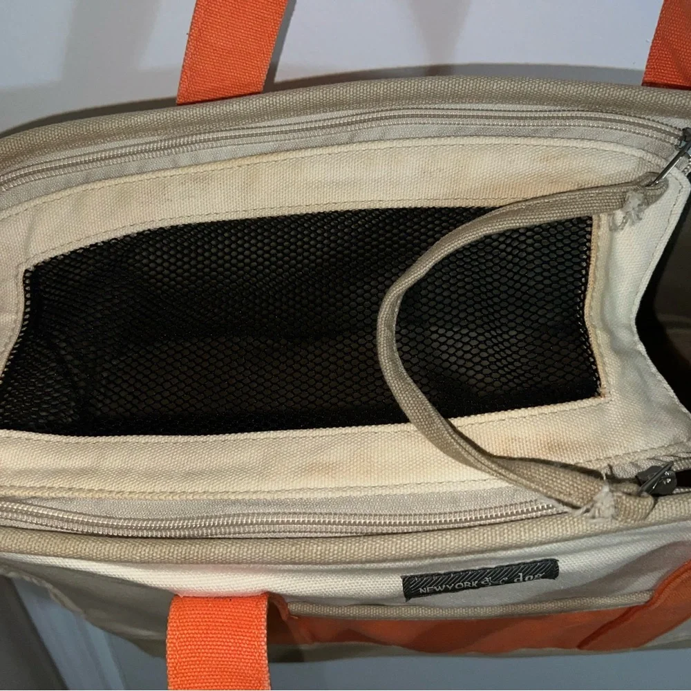 New York dog orange and cream colored dog carrier cold orange small/med